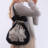 lacy collage drawstring bag